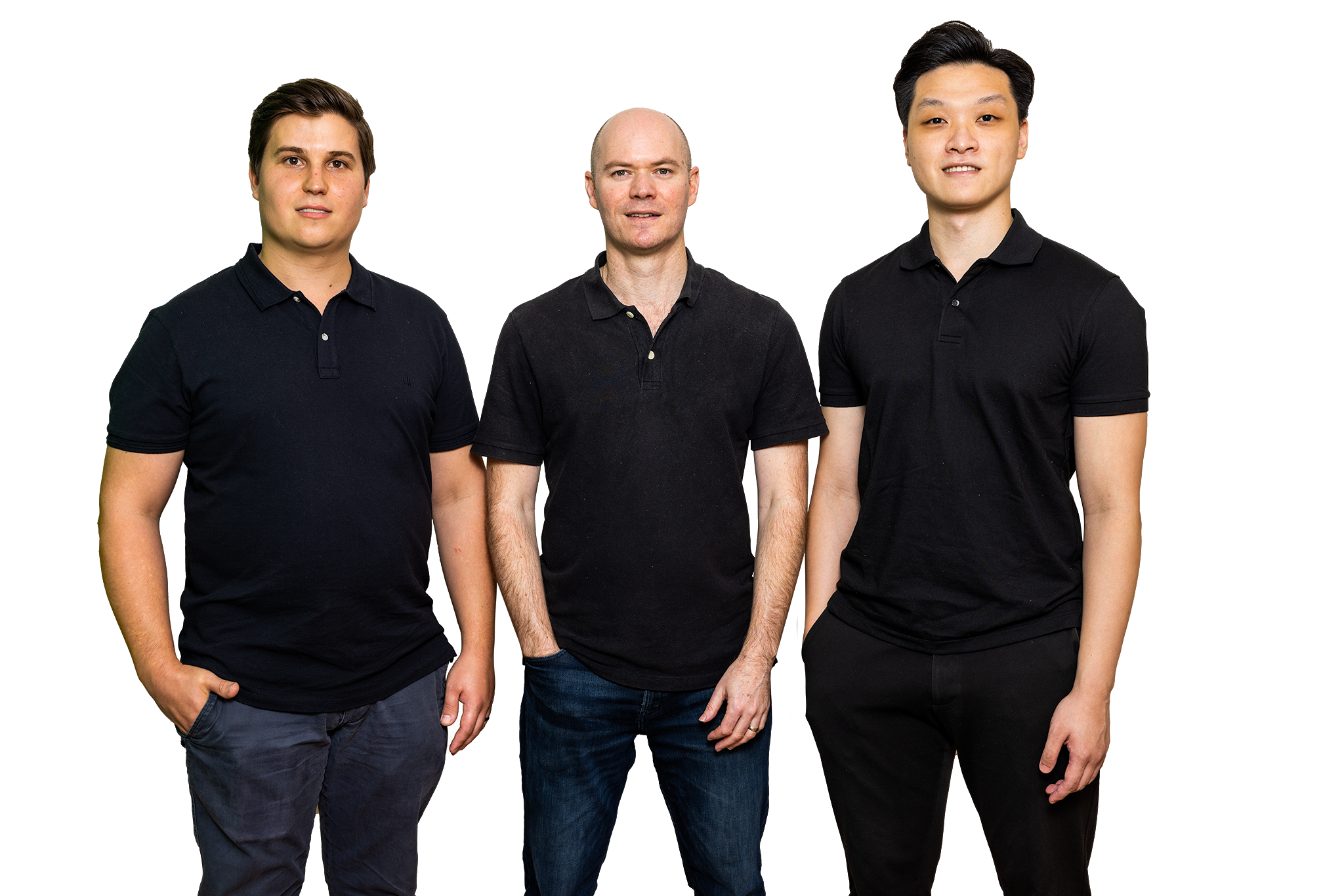 Five Dock Osteopathic and Chiropractic three male chiropractors are standing side by side. They have their right hands in their right pants pocket and left hand by their side. They are wearing black polo shirts and dark blue/balck jeans. They are smiling and facing straight on for the get in touch photo